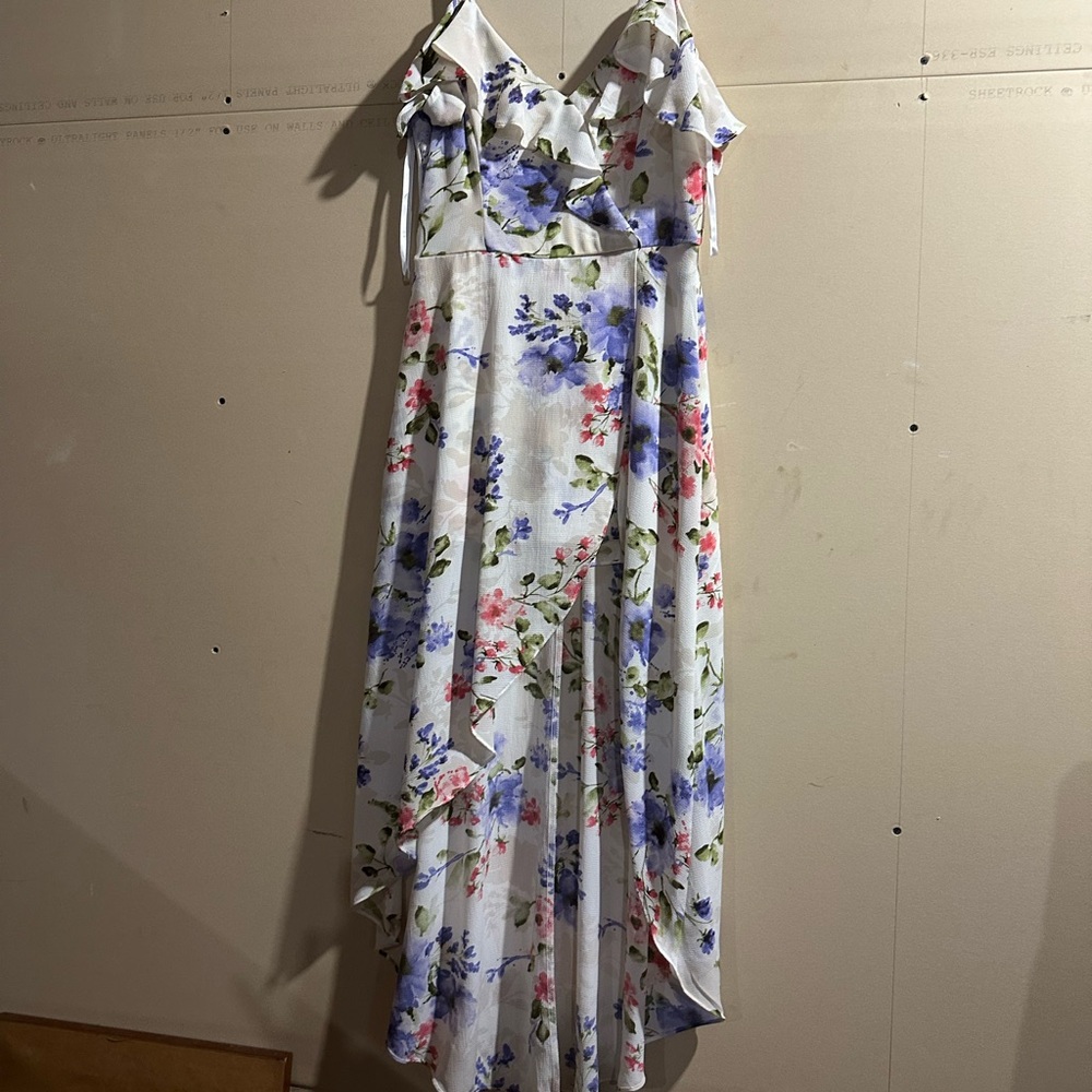 Floral High/low romper with Ruffle Details